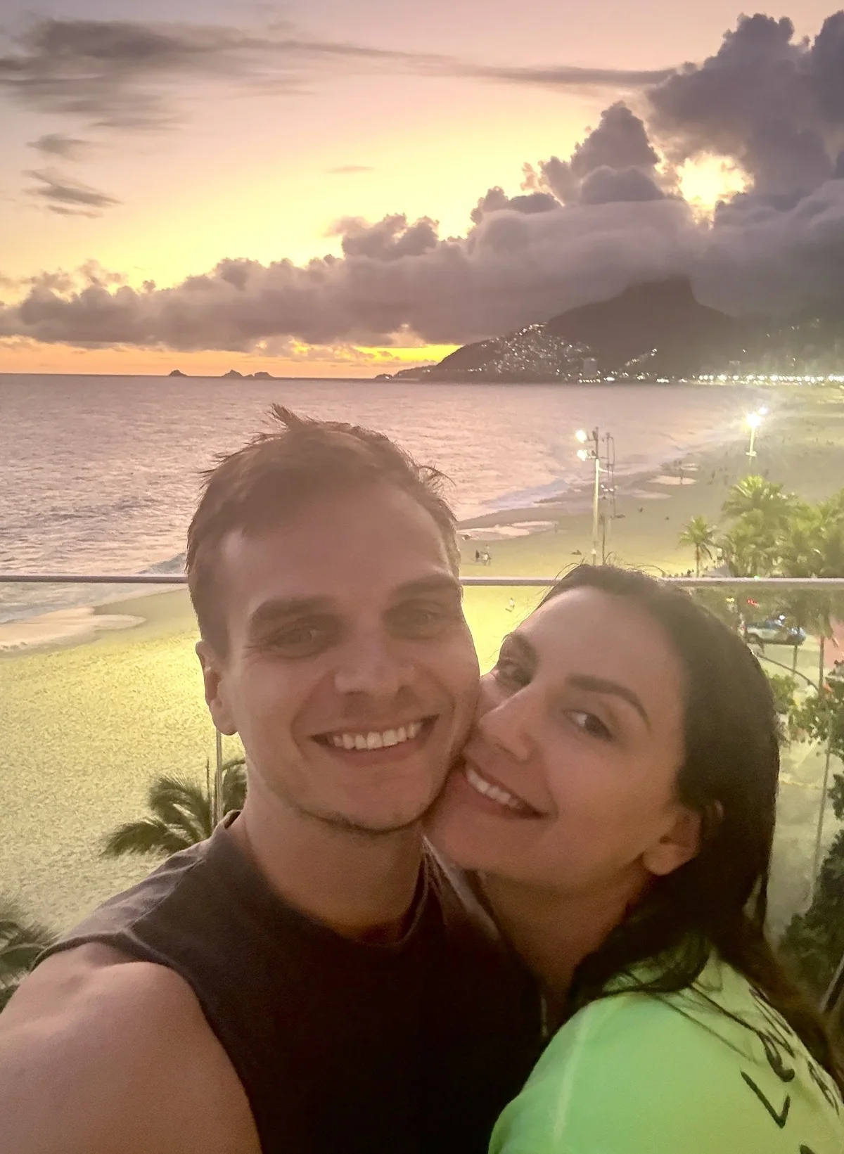 B&aacute;rbara and Matthew at sunset on a rooftop over Ipanema, Dois Irm&atilde;os on the horizon