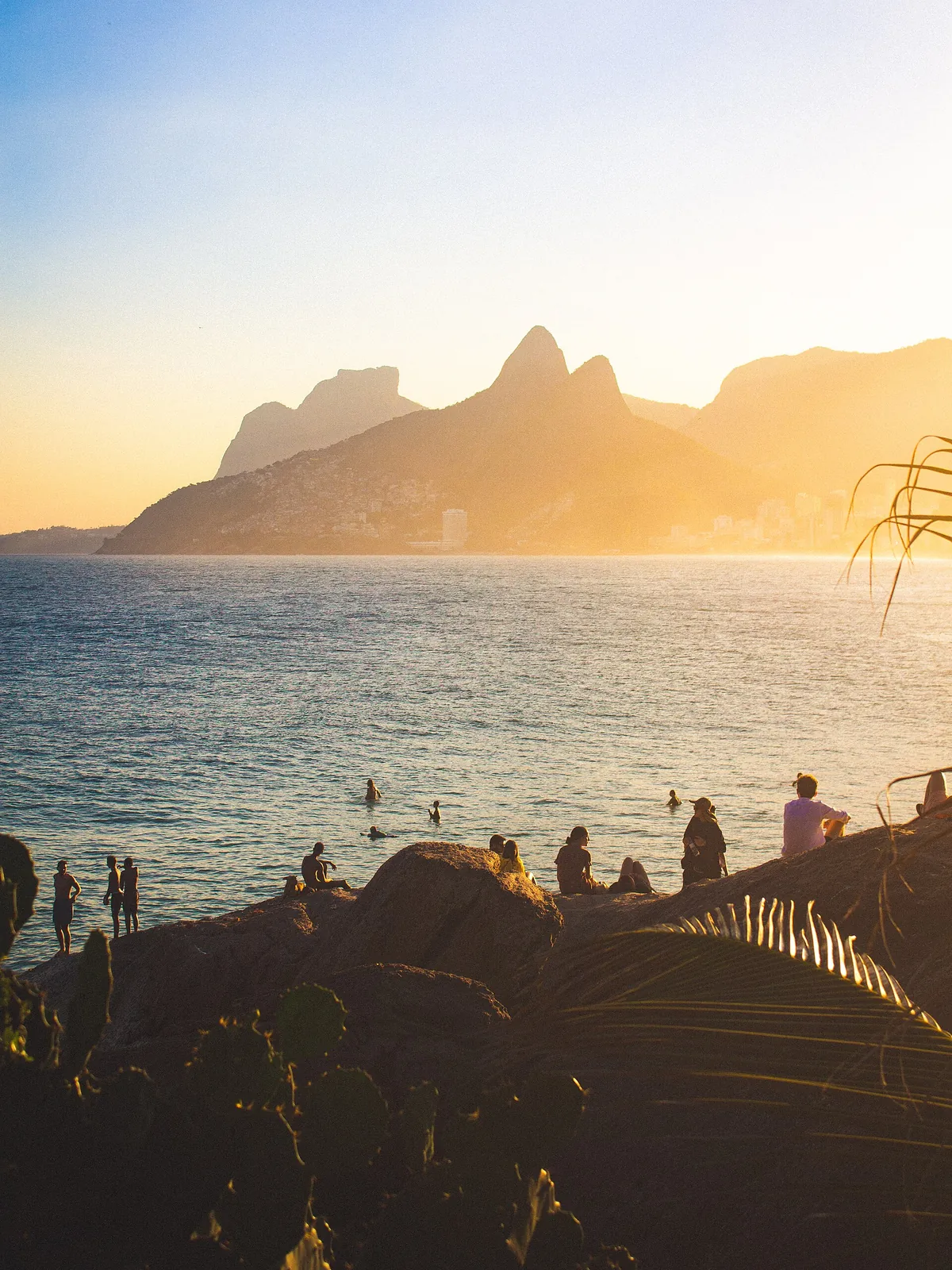 Sunset over Ipanema and Dois Irmãos from the Arpoador rocks